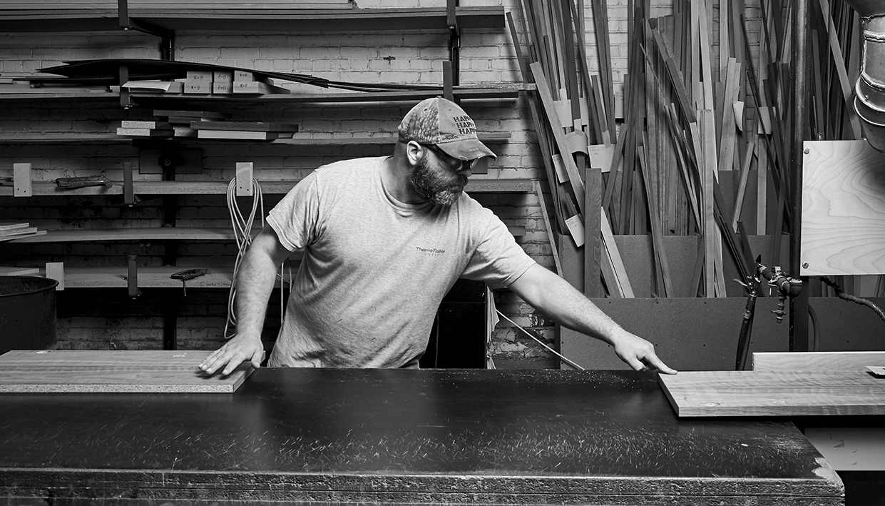 Kraig, Woodworking Associate | A sensitive guy, he can tell with one touch when the job is done right.