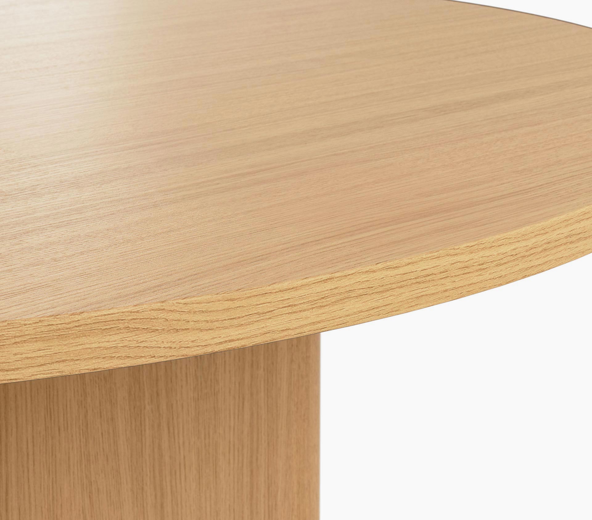 Edge detail on a racetrack-shaped JD Conference Table in natural rift cut oak with a 1.25” thick tabletop