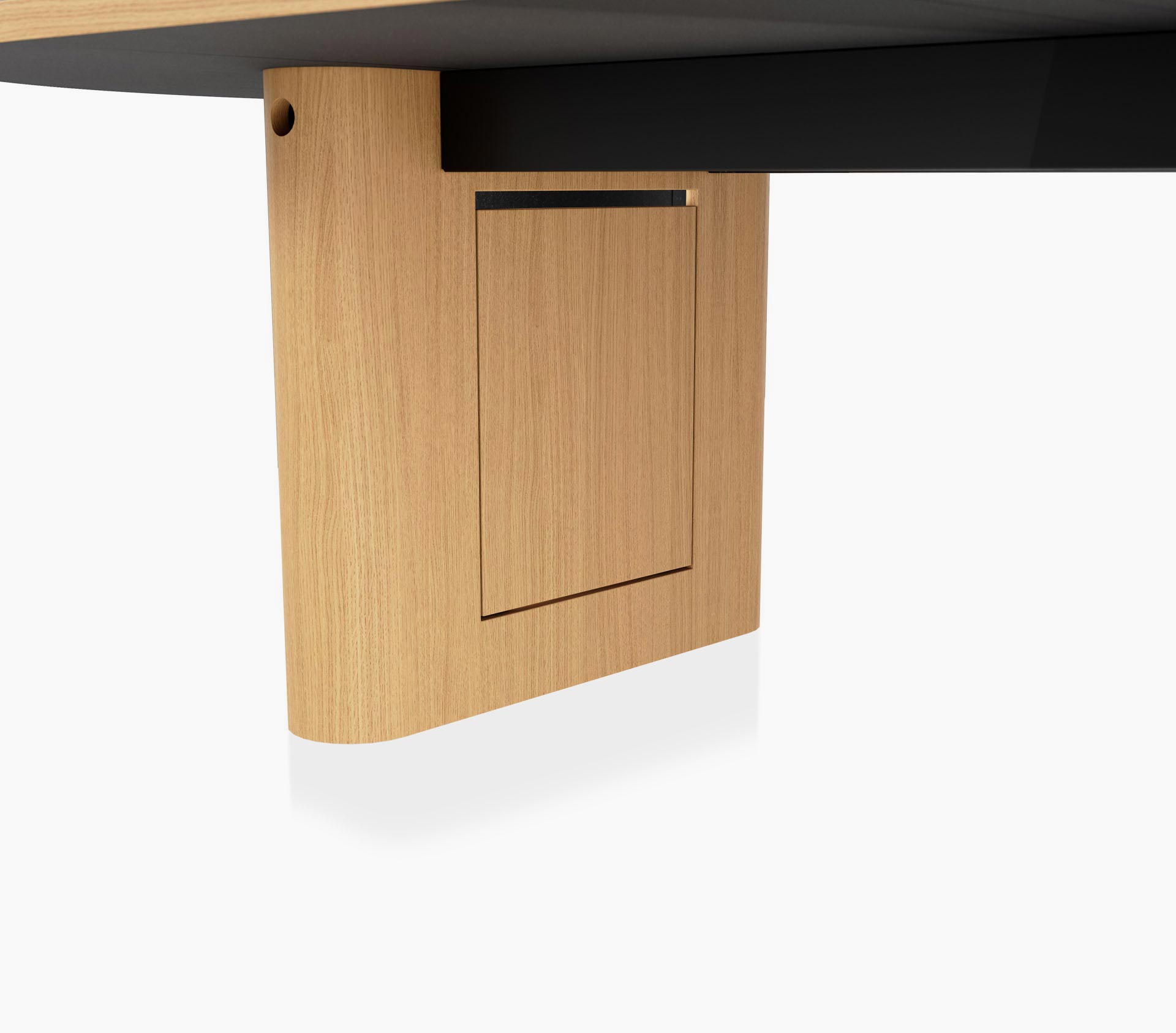 Closed wire management leg detail on a JD Conference Table in natural rift cut oak with a racetrack-shaped base