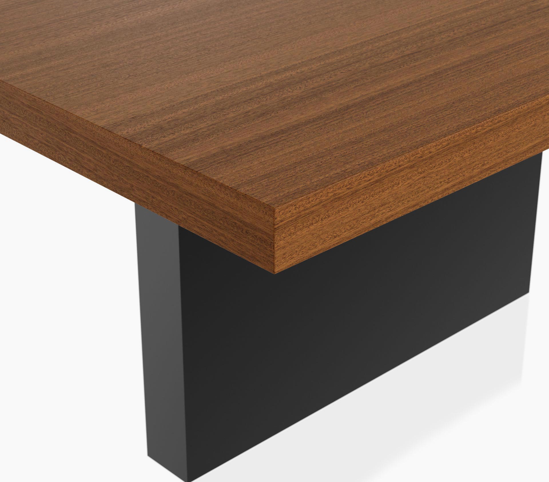 Edge detail on a rectangular JD Conference Table with a natural quarter cut walnut tabletop and a black base