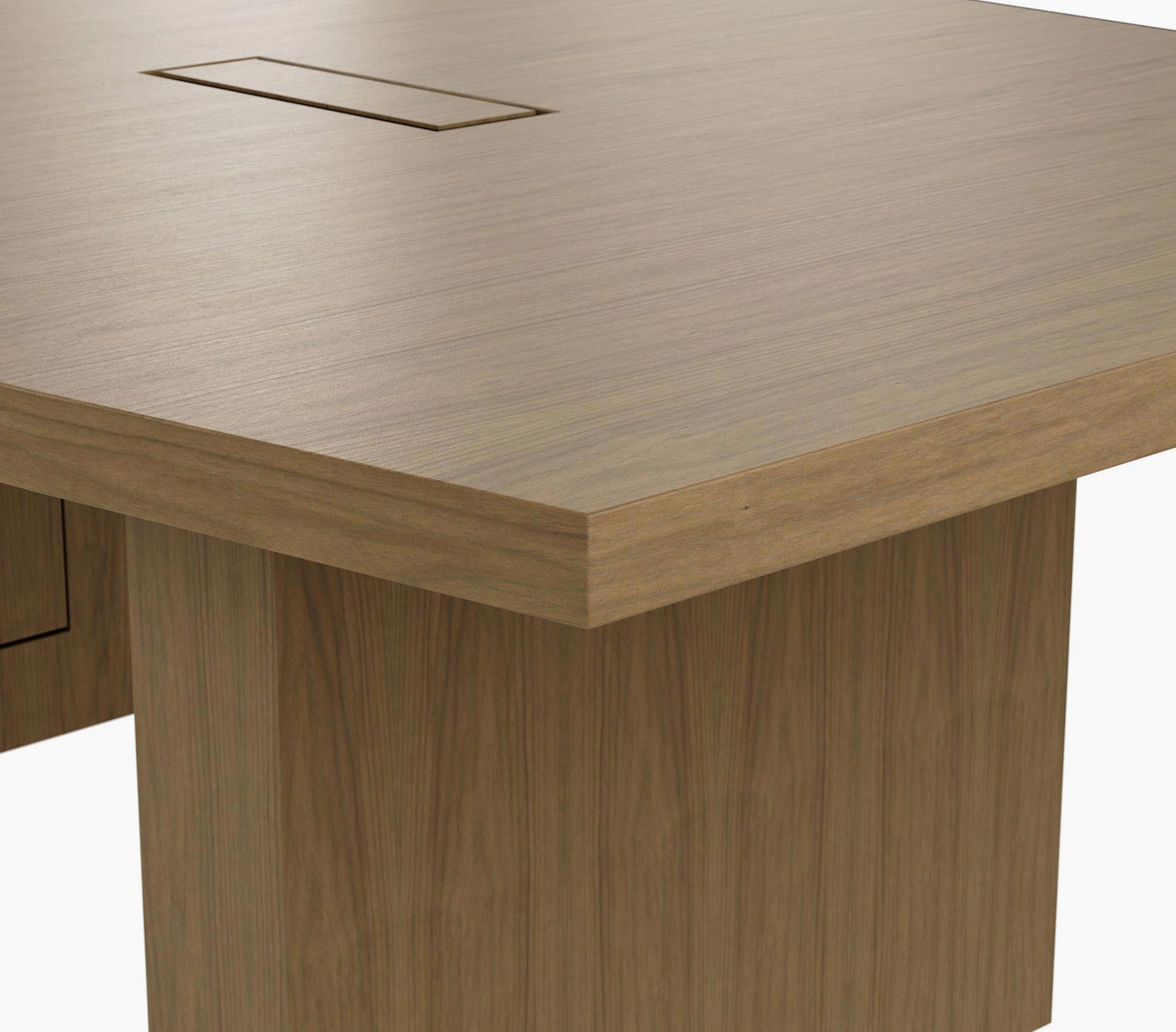 Edge detail on a boat-shaped JD Conference Table in natural flat cut walnut