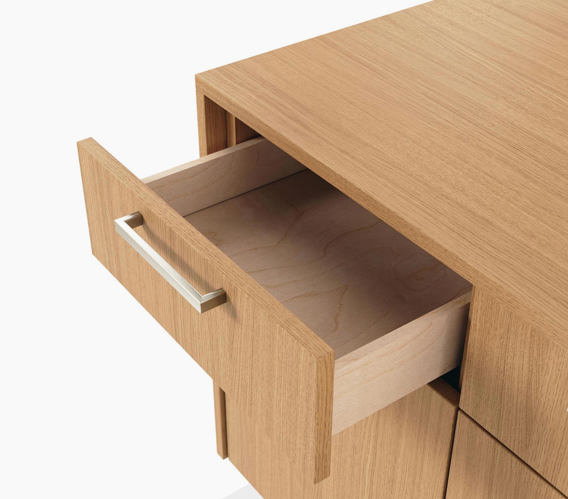 Open box drawer detail on a JD Credenza in natural rift cut oak with satin nickel drawer pulls