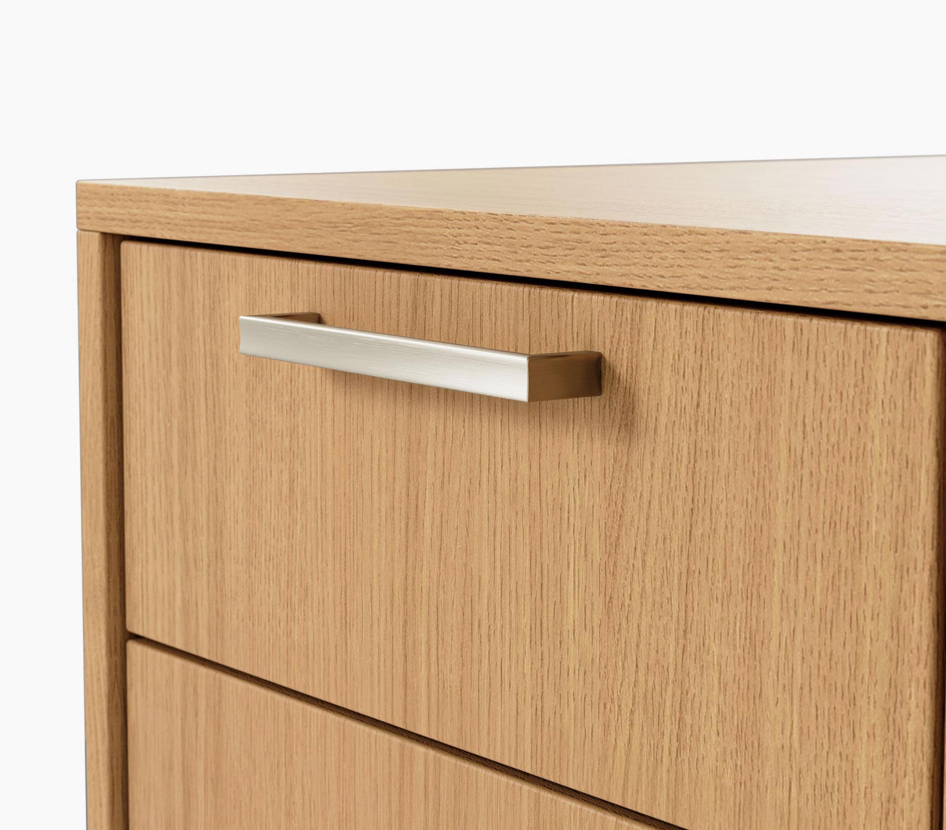 Drawer pull detail on a JD Credenza in natural rift cut oak with satin nickel pulls
