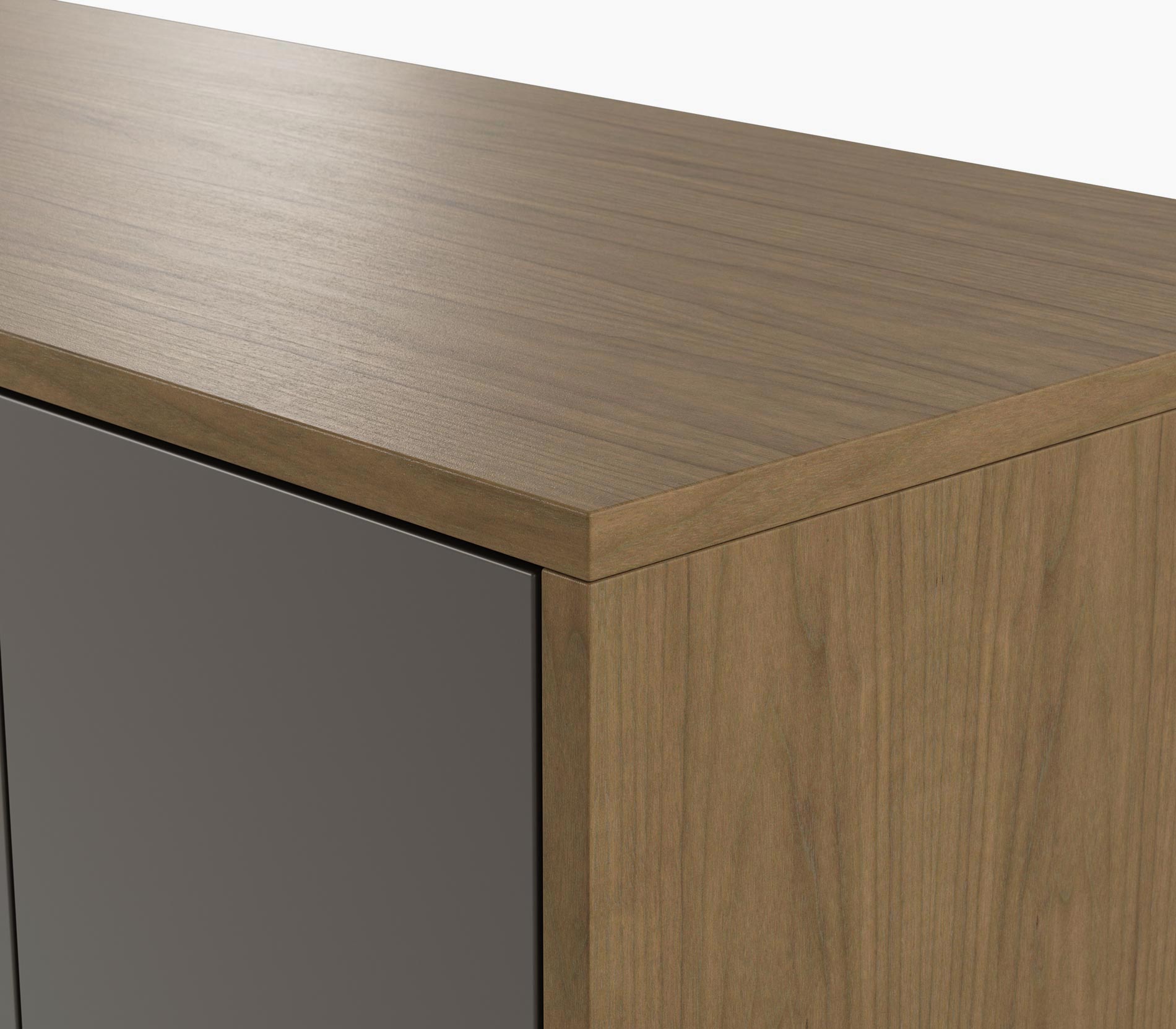 Edge detail on a Highline Twenty Five Credenza in natural flat cut walnut with a grey  painted front