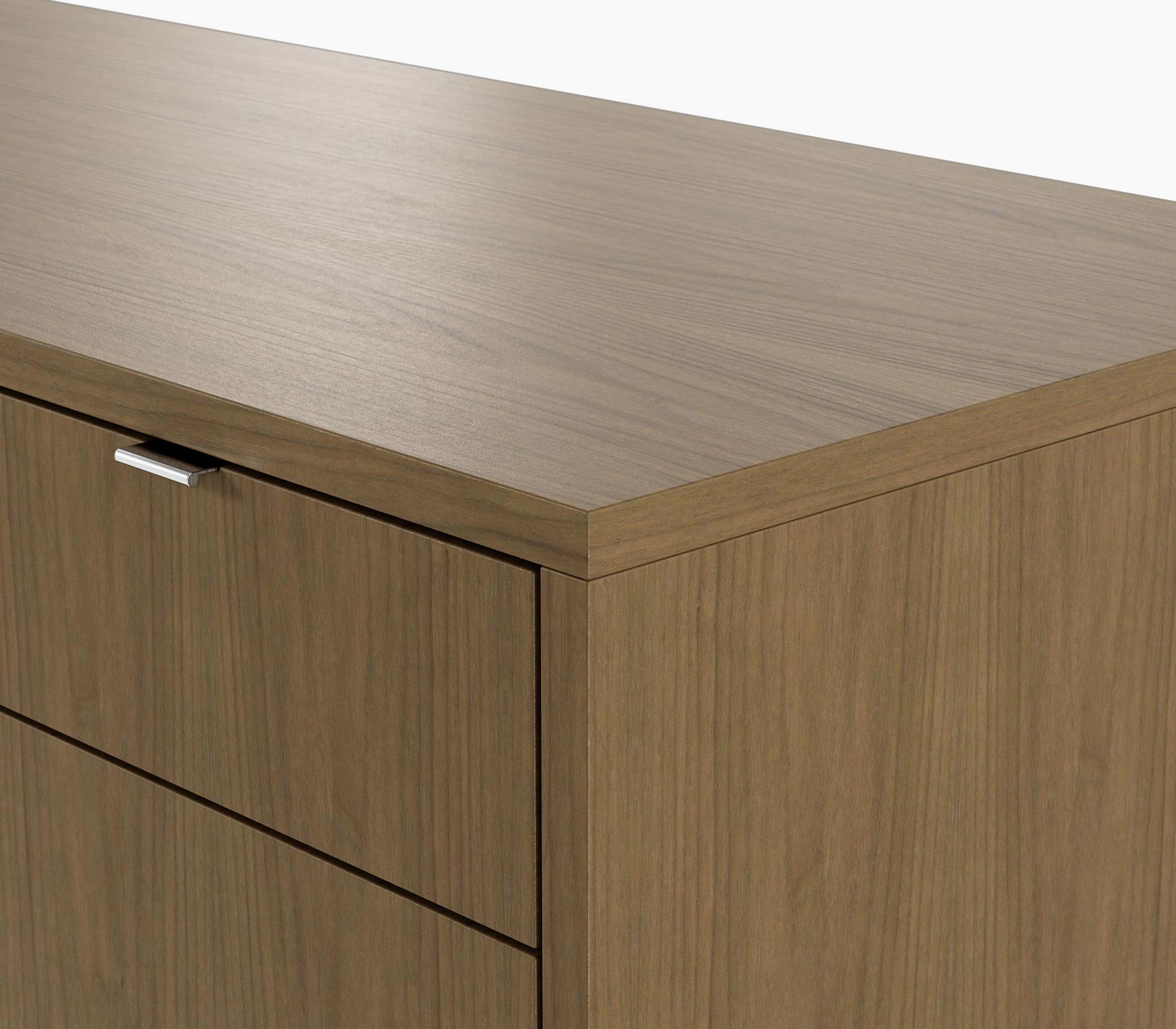 Edge detail on a Highline Twenty Five Credenza in natural flat cut walnut with  polished chrome drawer pulls