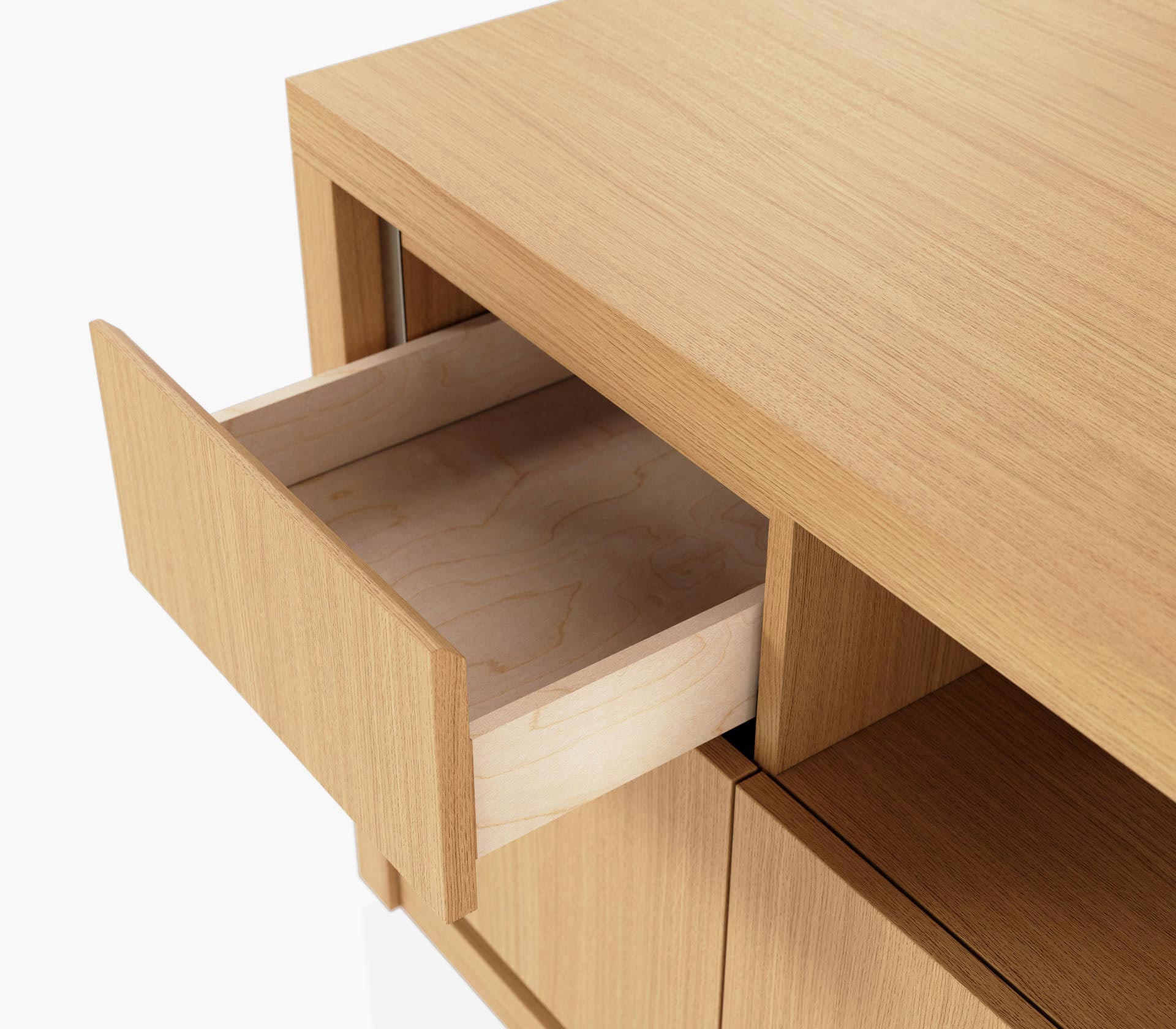 Open box drawer detail on a Highline Fifty Credenza in natural rift cut oak with a satin nickel trim