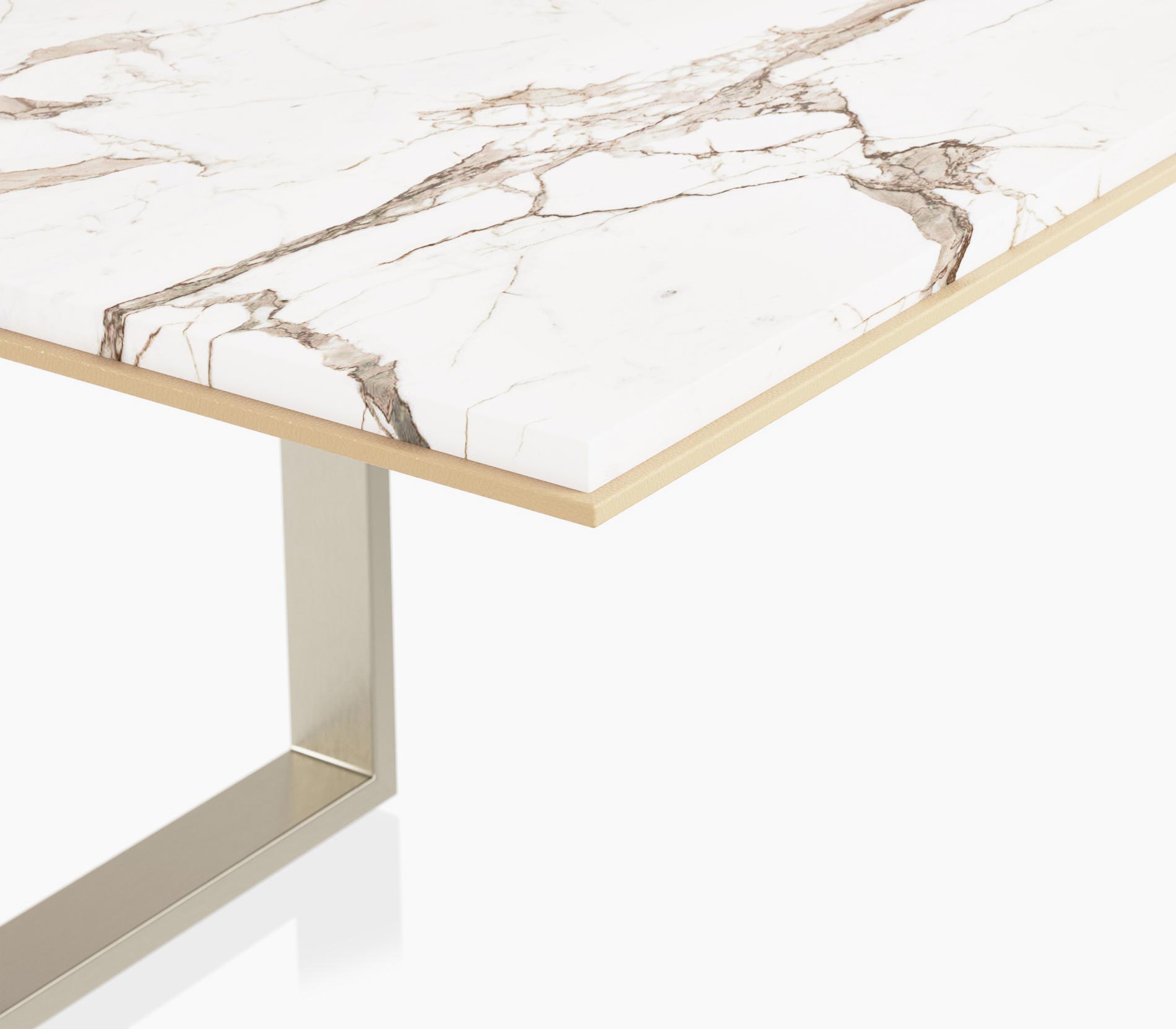 Edge detail on a Highline Conference Table in calacatta gold stone with a leather edge and satin nickel base
