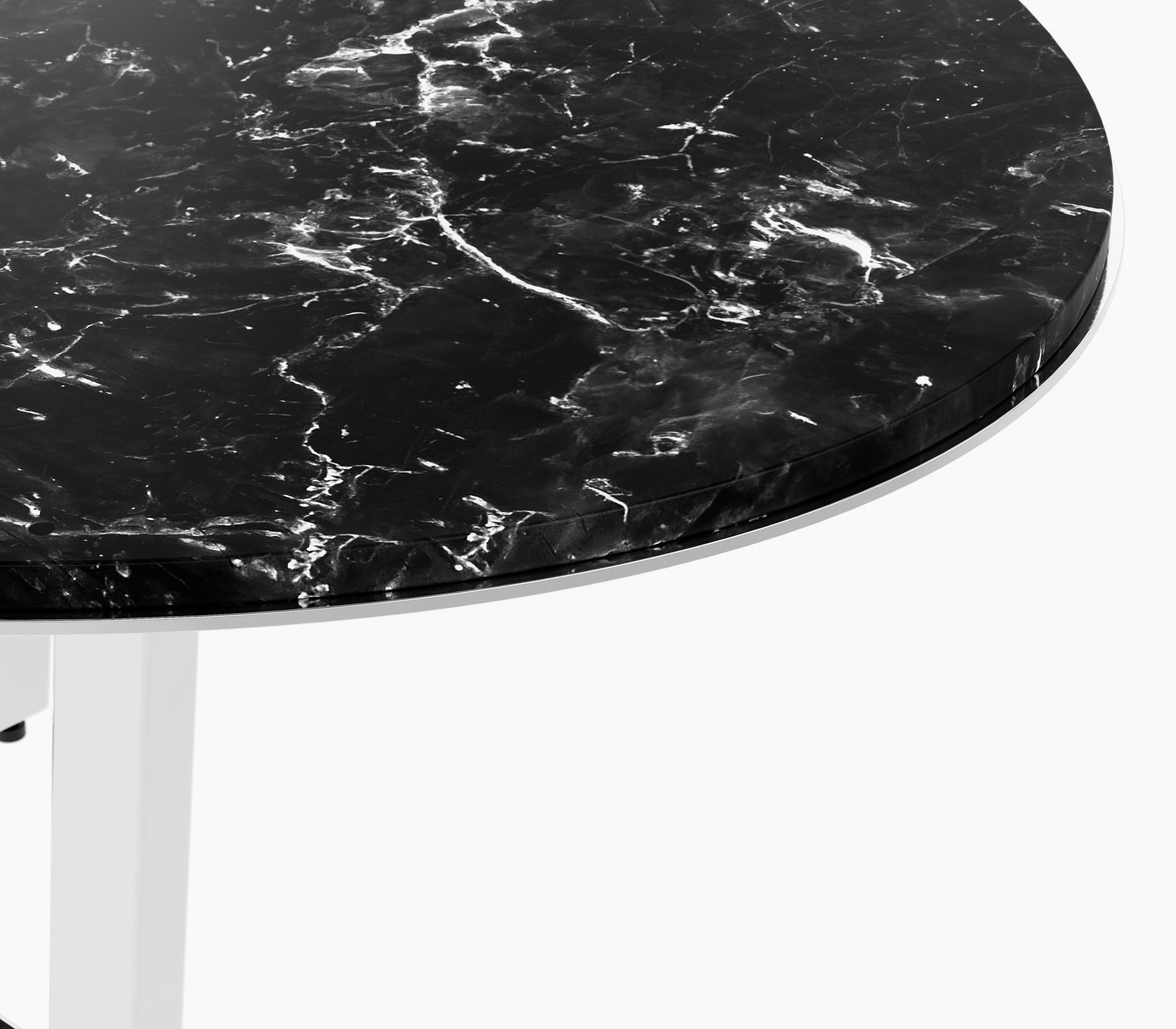 Edge detail on an Elliptical-shaped Highline Meeting Table in nero marquina honed marble with a polished chrome edge and base.